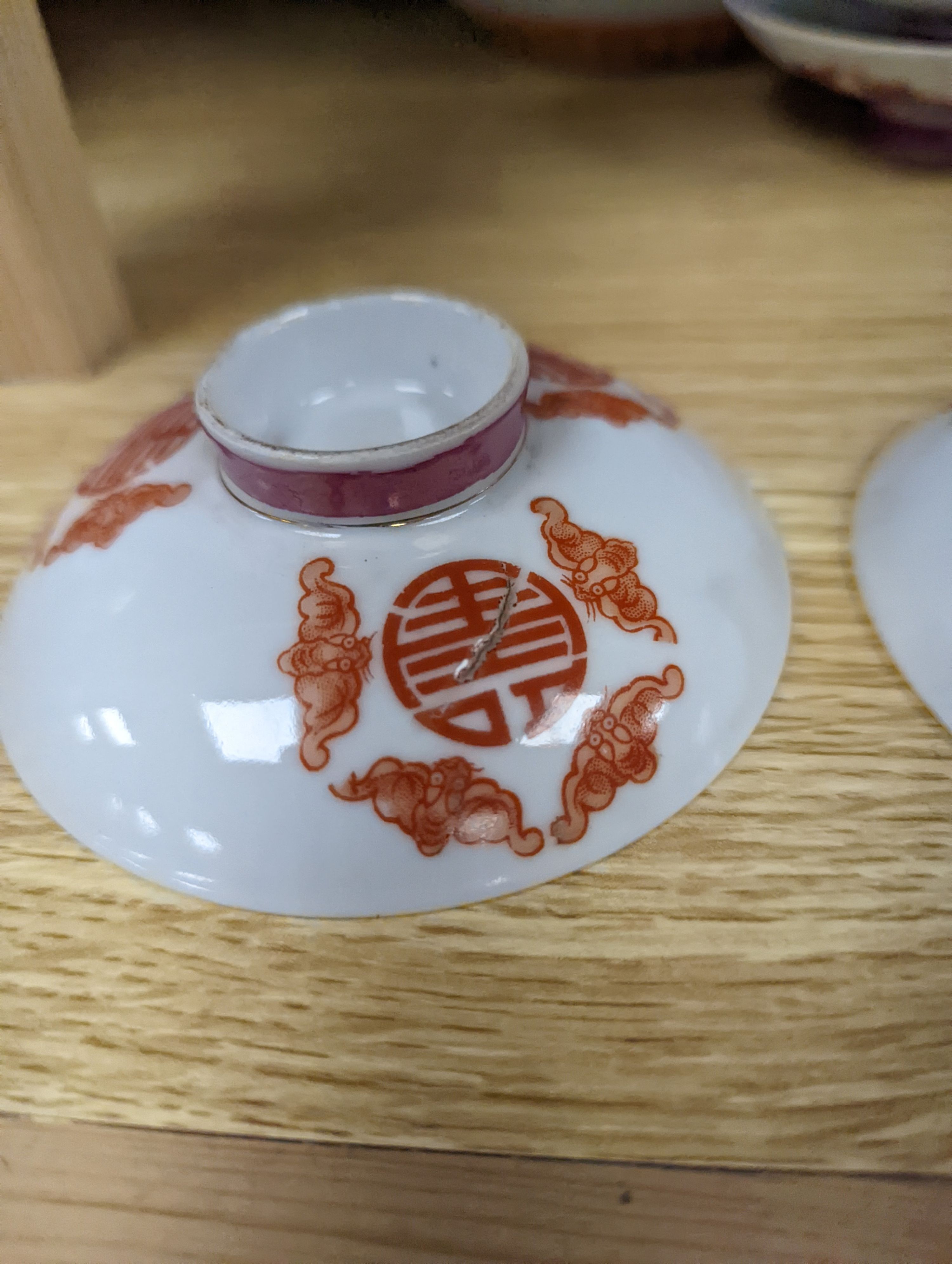 A set of five Chinese teabowls, covers and stands and a similar 'dragon' vase, 23cm